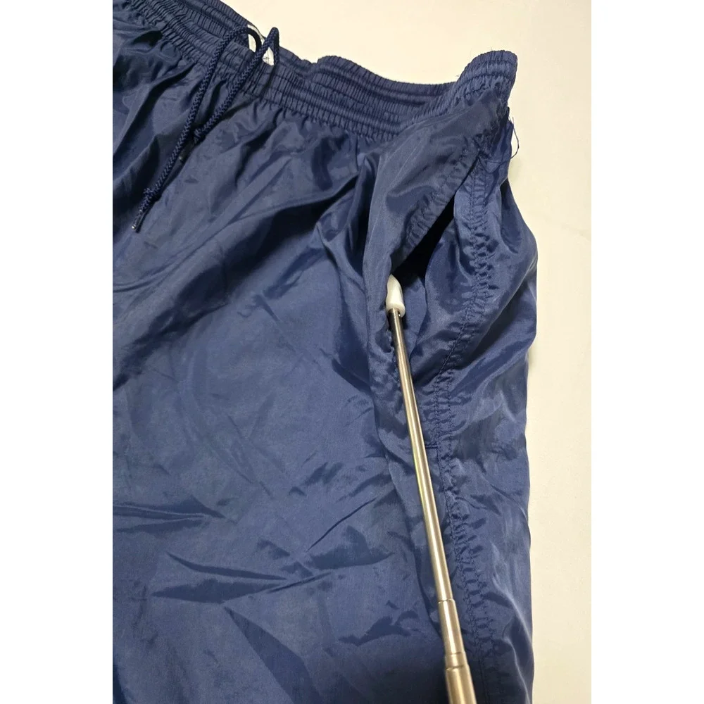 VTG Nike Windpants Mens XL Blue Nylon Track Pants Zipper Cuffs Lined Swoosh
